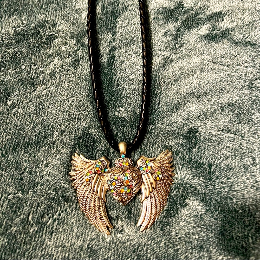 Biker necklace purchased at a bike rally years ago. Loved this one!